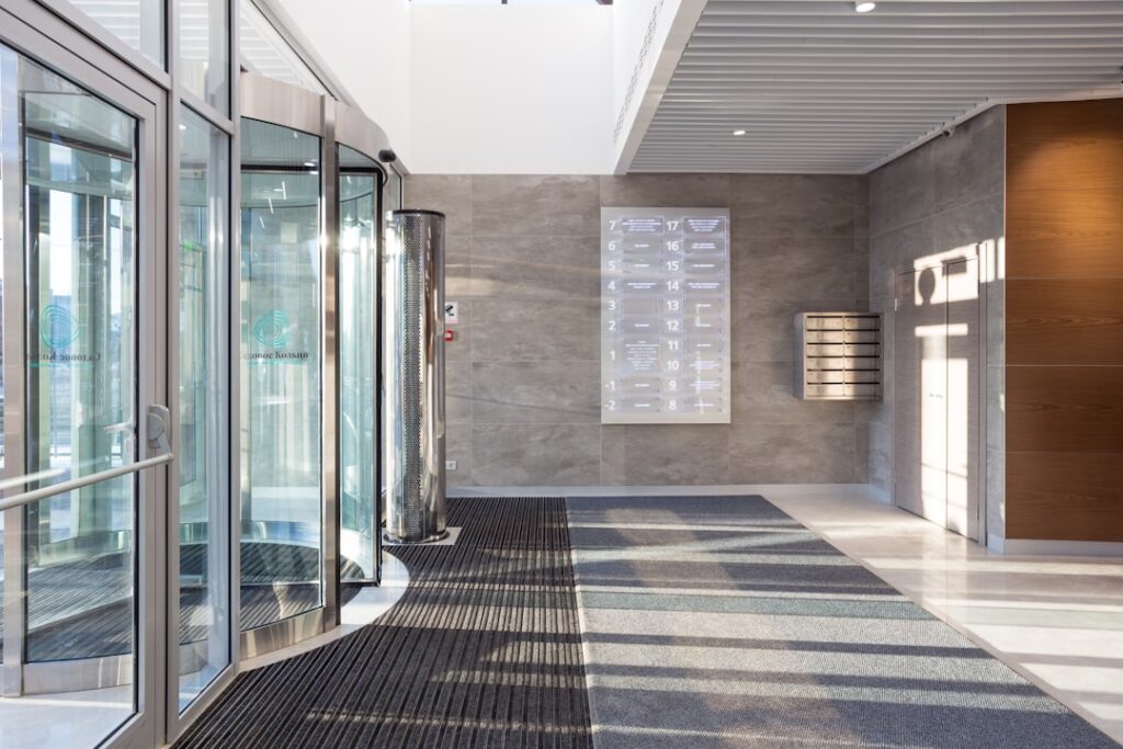 Modern commercial building entrance with secure glass doors